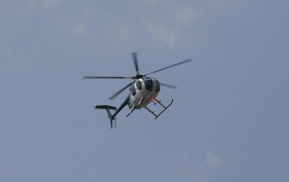 Helicóptero de la Policía sobrevuela los alrededores el Mónaco. <b>FOTO: </b>Juan Antonio Sánchez. Helicóptero de la Policía sobrevuela los alrededores el Mónaco. <b>FOTO: </b>Juan Antonio Sánchez.