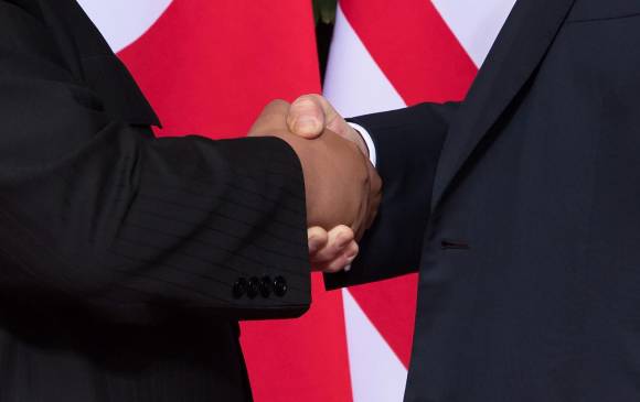 Donald Trump y Kim Jong Un durante su reunión. FOTO AFP Donald Trump y Kim Jong Un durante su reunión. FOTO AFP
