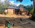 Esta es la vivienda en la que se ocultaba alias Otoniel en Necoclí. Foto: Cortesía Policía.