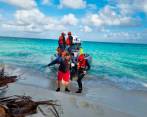 Momento del rescate de los cuatro extranjeros en Cayo Bolívar. FOTO ARMADA NACIONAL