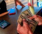 La aversión al riesgo viene impulsando al dólar desde ayer. FOTO CAMILO SUÁREZ