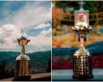 El trofeo de la Copa Libertadores en el Alto de las Palmas y en una parte del Graffiti Tour de la Comuna 13. FOTOS: TOMADAS DEL TWITTER DE @GloriaEterna 