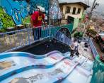 Comunidad de la 13 busca recursos para preservar el arte de su graffitour