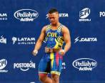 El pesista Estiven Villar del registro de la Liga de Bogotá le dio el primer oro a Colombia en los Juegos Panamericanos. FOTO: CORTESÍA COC
