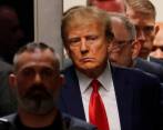 El expresidente entró en la sala del juzgado con un claro gesto de disgusto y sin llevar esposas. FOTO: EFE