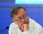 La revista recordó que el hermano y el hijo del jefe de Estado están acusados de “recibir sobornos de bandas de narcotraficantes para lograr concesiones en el proceso de alto el fuego”. FOTO: PRESIDENCIA