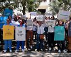 Cientos de empleados de las tres empresas antioqueñas manifestaron su inconformiudad este martes. FOTO: Carlos Velásquez