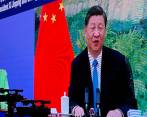 La alta Comisionada de la ONU para los Derehos Humanos, Michelle Bachelet, y el presidente de China, Xi Jinping, hablaron de forma virtual sobre derechos humanos. FOTO: AFP