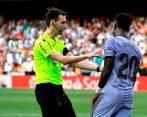 Tras ser expulsado en el duelo contra Valencia, Vinicius ha recibido apoyo alrededor del mundo tras ser objeto de ataques racistas. FOTO AFP 