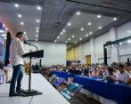 En un congreso con empresarios, el presidente dijo que prevé decrecimiento económico en el país.
