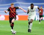El Real Madrid tuvo la opción, al minuto 90, de irse ganador tras un disparo de Aurélien Tchouaméni que sacó el arquero Ederson. Antonio Rüdiger y Kevin De Bruyne, dos de los protagonistas en el Bernabéu. FOTO Getty 