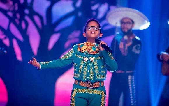 Why in Colombia do children sing so many rancheras?