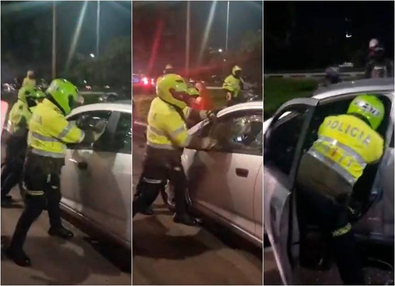 Un grupo de policías golpeó un vehículo que hacía parte de los bloqueos en la noche de este lunes en Bogotá. FOTO: CAPTURA DE VIDEO