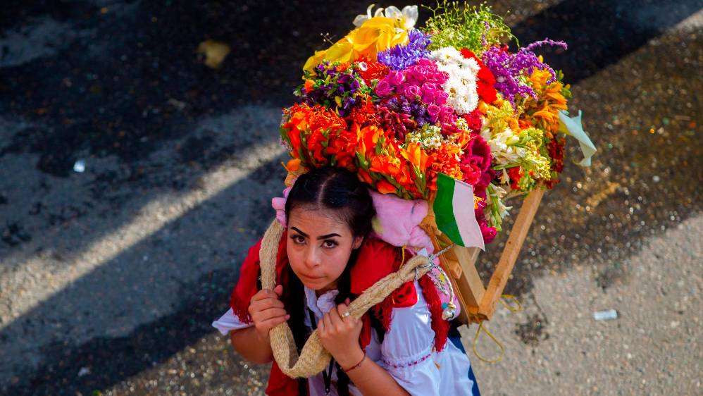 El desfile recorrió un total de 2.4 kilómetros a lo largo de la avenida del Río desde el puente de Guayaquil hasta llegar al Pabellón Blanco de Plaza Mayor. Foto: CAMILO SUÁREZ ECHEVERRY.