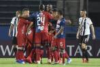 El festejo escarlata en Asunción después de una buena presentación en su despedida del torneo continental. Ahora se concentrará en la Liga para intentar clasificarse entre los ocho. FOTO afp