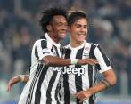 Juan Guillermo Cuadrado y Paulo Dybala han armado una buena sociedad colombo-argentina en la Juventus. FOTO reuters 