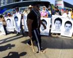 Manifestación que se llevó a cabo en Acapulco, Guerrero, el 19 de diciembre pasado, para exigir justicia para los estudiantes desaparecidos en Iguala. FOTO REUTERS