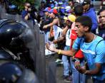 La marcha derivó en enfrentamientos en Caracas entre protestantes y la Policía. Foto AFP