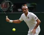 El suizo Roger Federer avanza en Wimbledon en busca de nuevas marcas y nuevos registros históricos para el tenis mundial. FOTO AFP