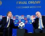 Vitali Mutkó y Gianni Infantino. FOTO: EFE