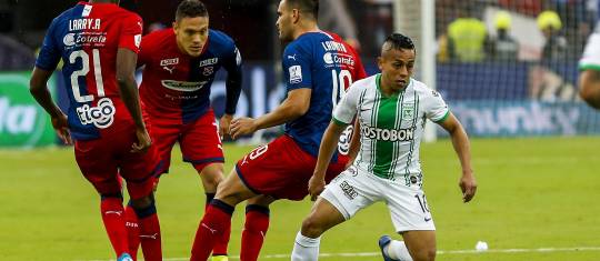 El local será Nacional, y Javier Reina del DIM, en la foto junto a Vladimir Hernández, serían protagonistas. FOTO julio c. Herrera