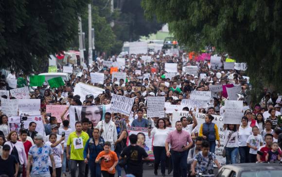 Cientos de personas salieron a las calles del municipio de Ecatepec, en el Estado de México, a reclamar justicia y en defensa de la mujer. EFE.