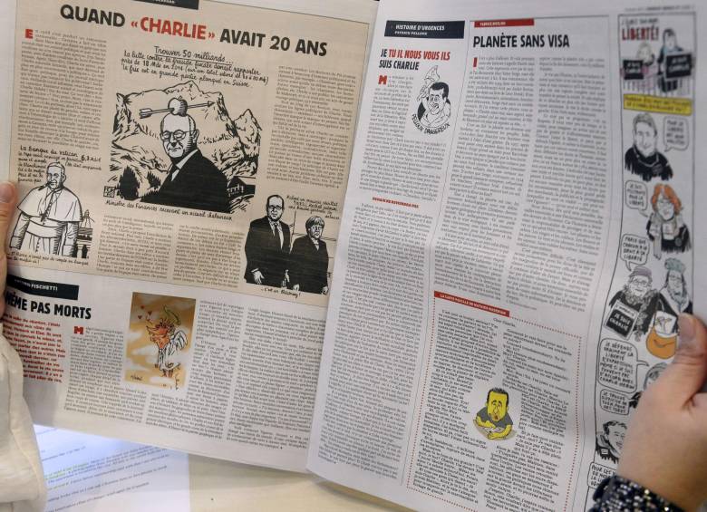 Los primeros ejemplares de este número especial de Charlie Hebdo se agotaron recién puestos a la venta. FOTO AFP