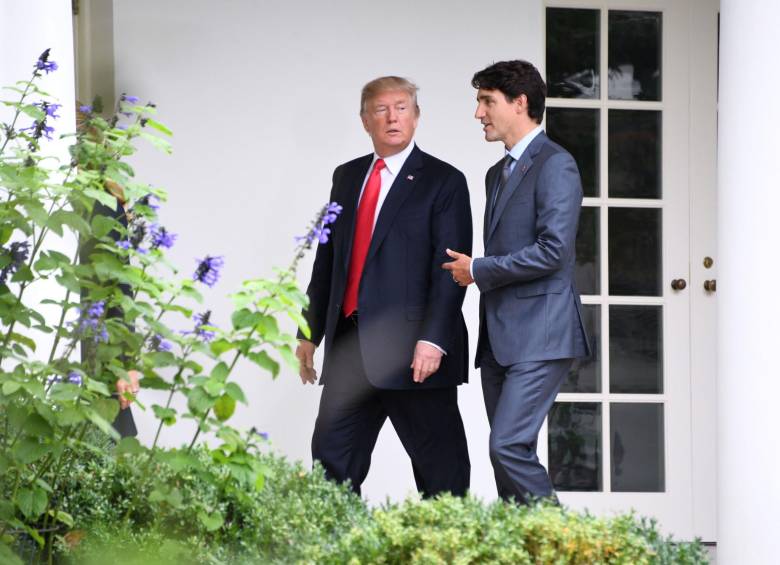 Donald Trump, presidente de Estados Unidos, y Justin Trudeau, primer ministro de Canadá. FOTO: AFP