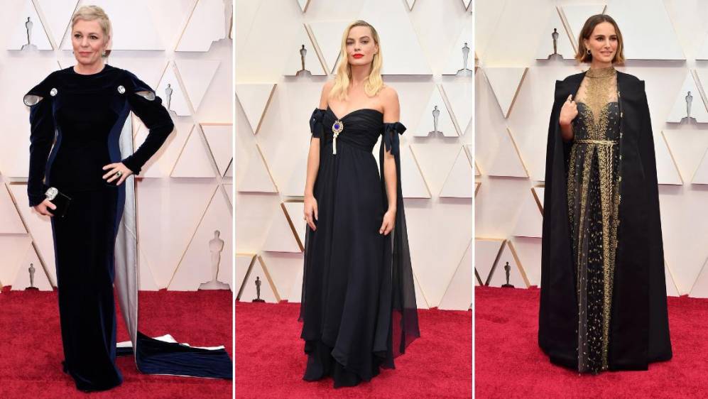 Olivia Colman, Margot Robbie y Natalie Portman que en su vestido, tiene como detalle en el abrigo, los nombres (cosidos) de las directoras de cine que no han sido nominadas al Oscar. FOTOS AFP